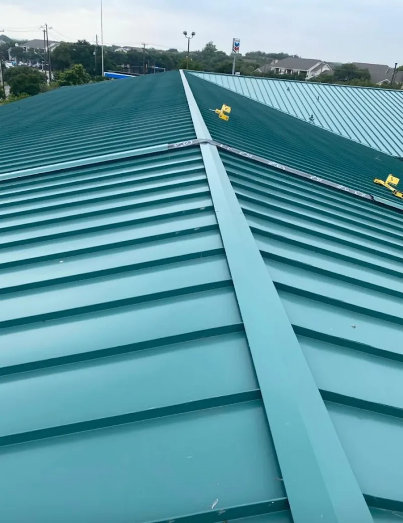 Green commercial metal roof ridge and valley for Metal Roof Repair in Terre Haute