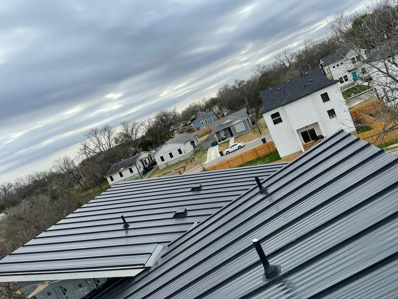 Standing seam metal roof panels with vents for Skylight Repair in Terre Haute